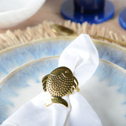 Set of 4 round gold-plated napkin rings 