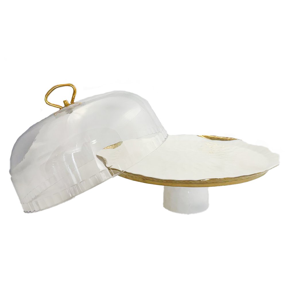 Witte porselein cake bel gouden randen met taartschop