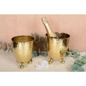 Gouden ijsemmer gehamerd met tang