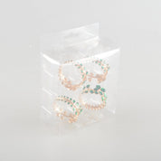 Set van 4 rondes gouden handdoeken met groene diamanten