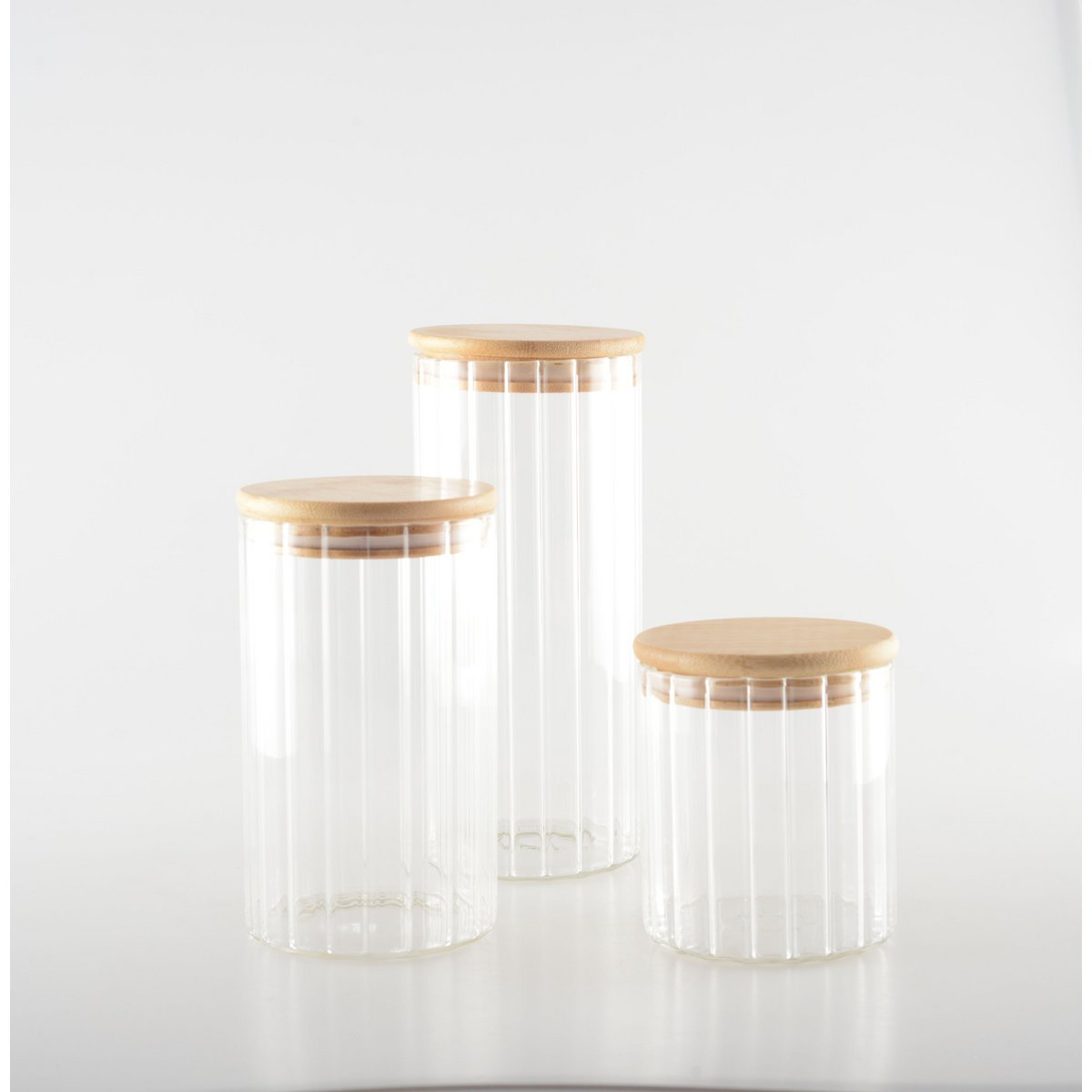 Glass and wooden storage jar